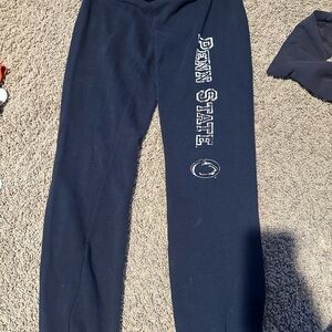 dark blue Penn State Soffe sweatpants, size M w drawstrings and zippers at legs